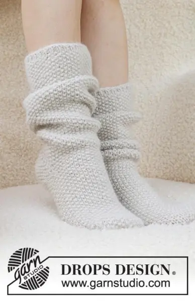 234-73 Snow White Socks by DROPS Design