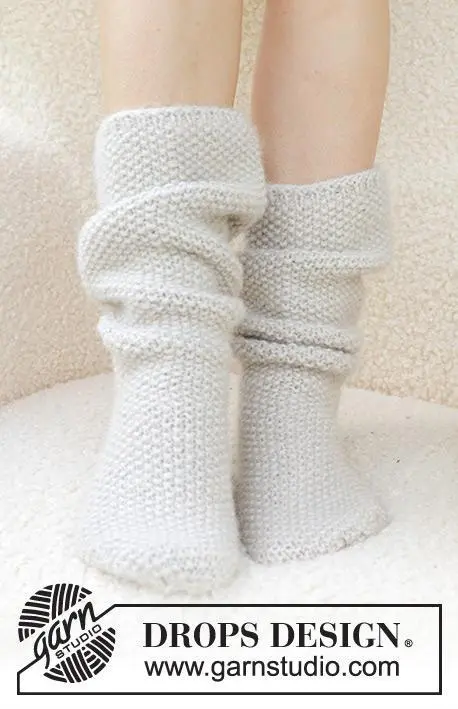 234-73 Snow White Socks by DROPS Design